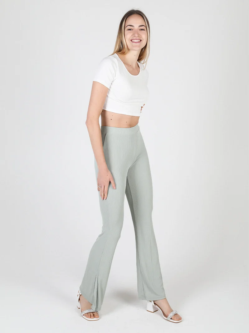 Leggings donna leggeri con finale a zampa e spacco laterale - verde