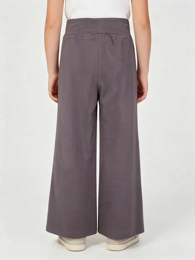 Leggings da bambina effetto ciniglia con finale a zampa - grigio