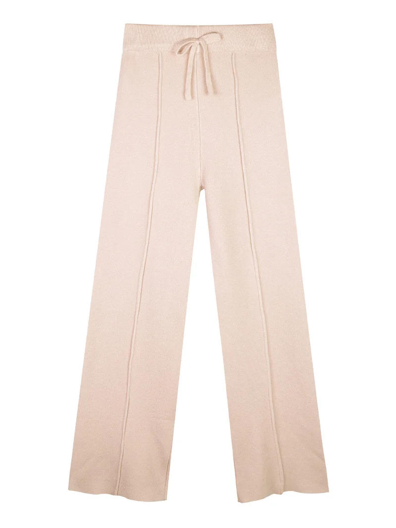 Pantaloni da bambina in maglia con finale a zampa - beige