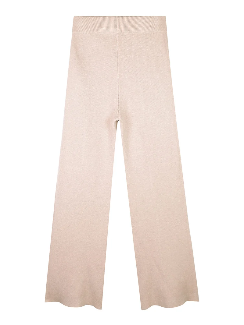 Pantaloni da bambina in maglia con finale a zampa - beige