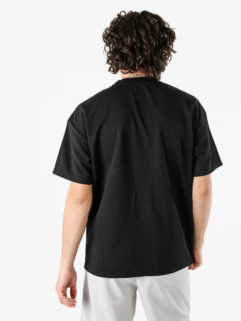 T-shirt girocollo da uomo a nido d'ape - nero