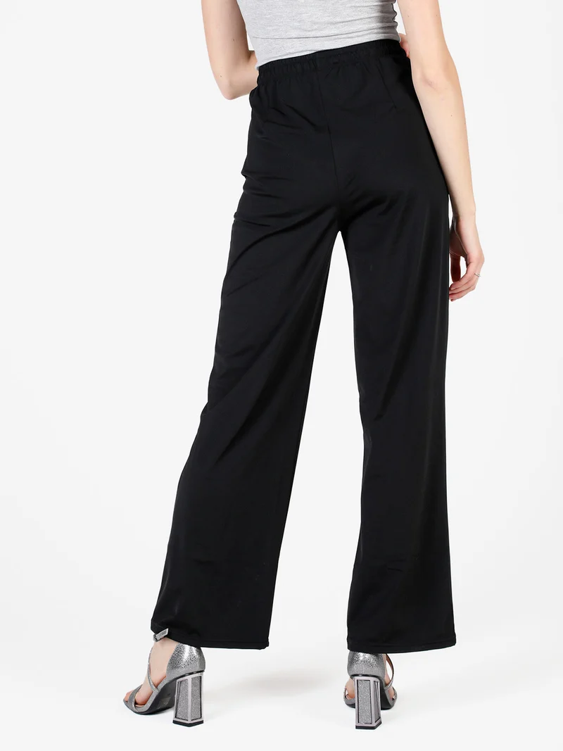 Pantaloni donna in tessuto tecnico a gamba larga - nero