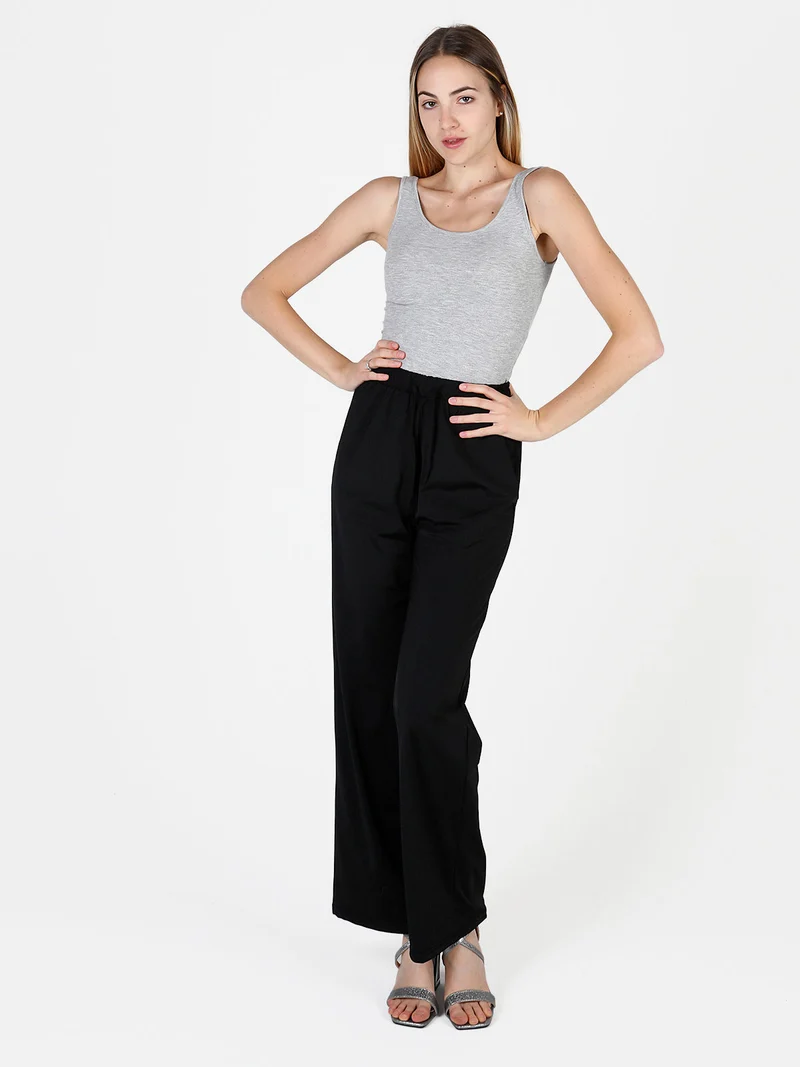 Pantaloni donna in tessuto tecnico a gamba larga - nero