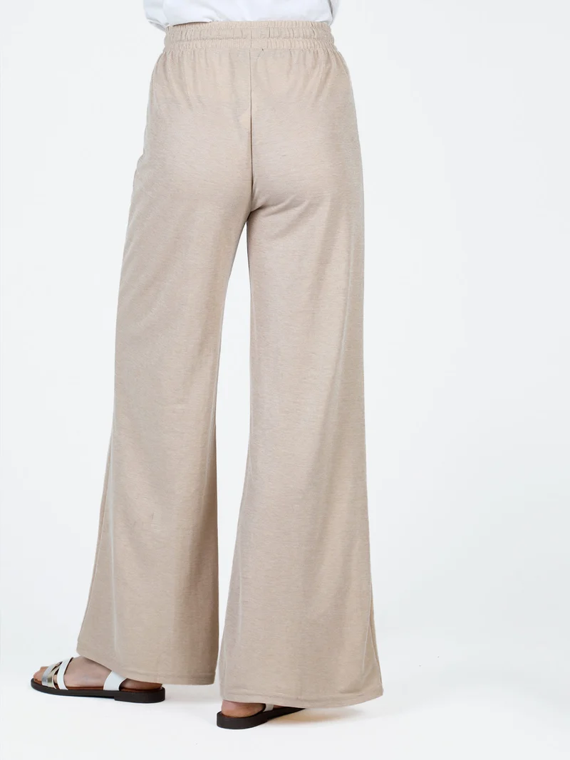 Pantaloni donna a palazzo - beige