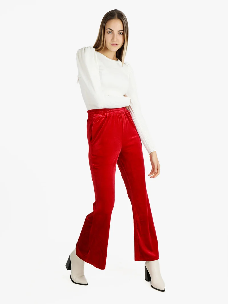 Pantaloni a zampa da donna in velluto - rosso