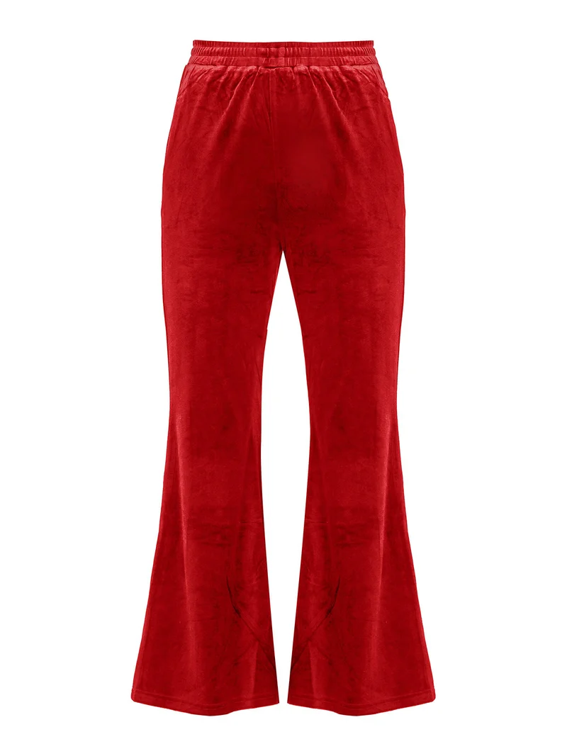Pantaloni a zampa da donna in velluto - rosso