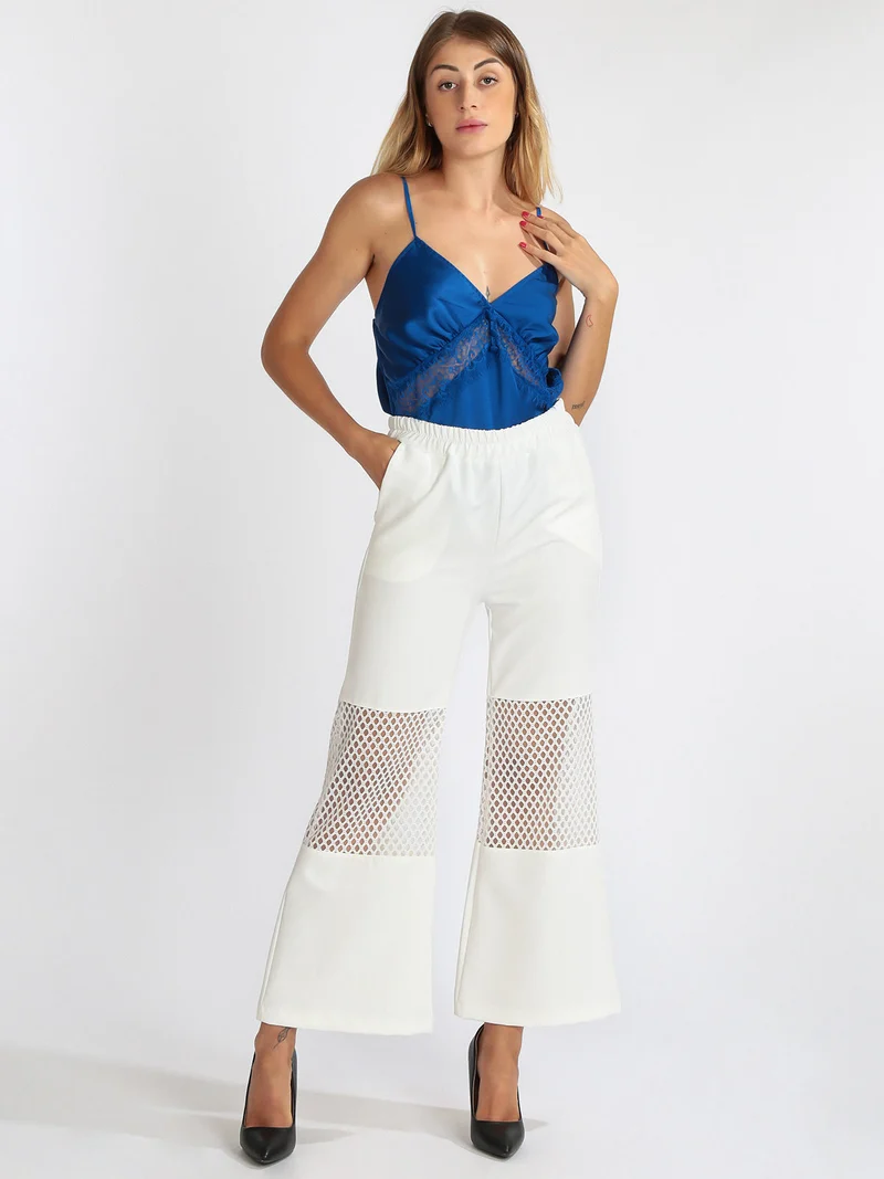 Pantaloni donna a zampa con dettaglio a rete - bianco