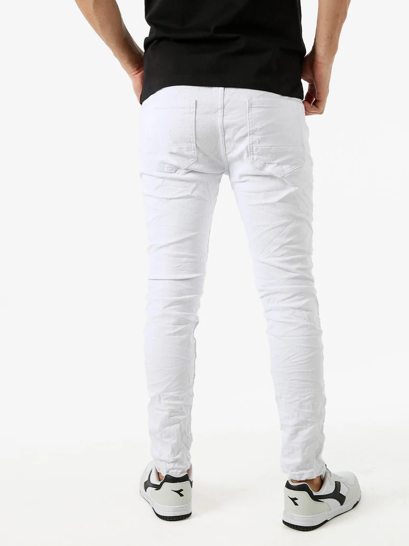 Jeans da uomo skinny con strappi - bianco
