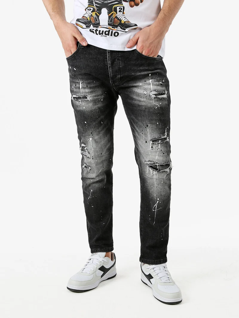 Jeans skinny da uomo con strappi - nero