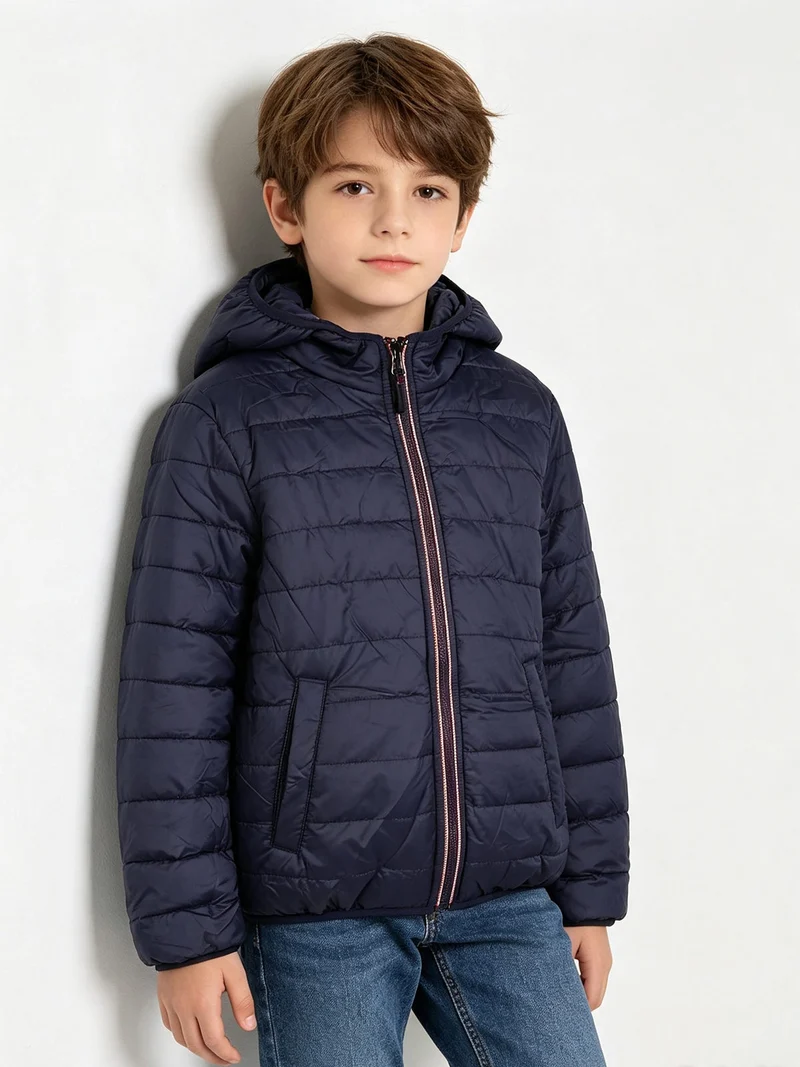 Giubbotto da bambino reversibile con cappuccio e zip - blu scuro