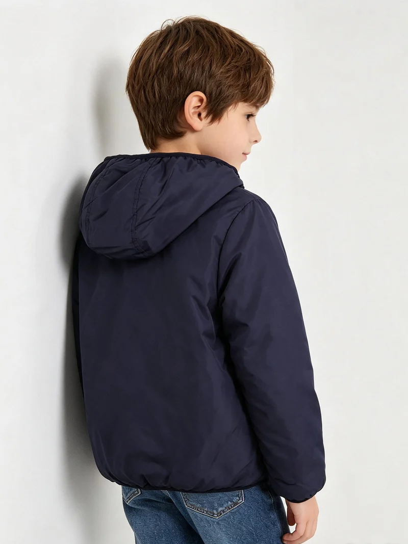 Giubbotto da bambino reversibile con cappuccio e zip - blu scuro