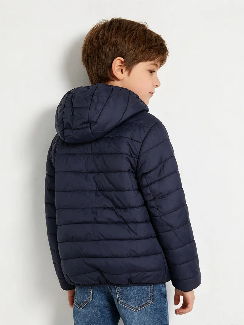 Giubbotto da bambino reversibile con cappuccio e zip - blu scuro
