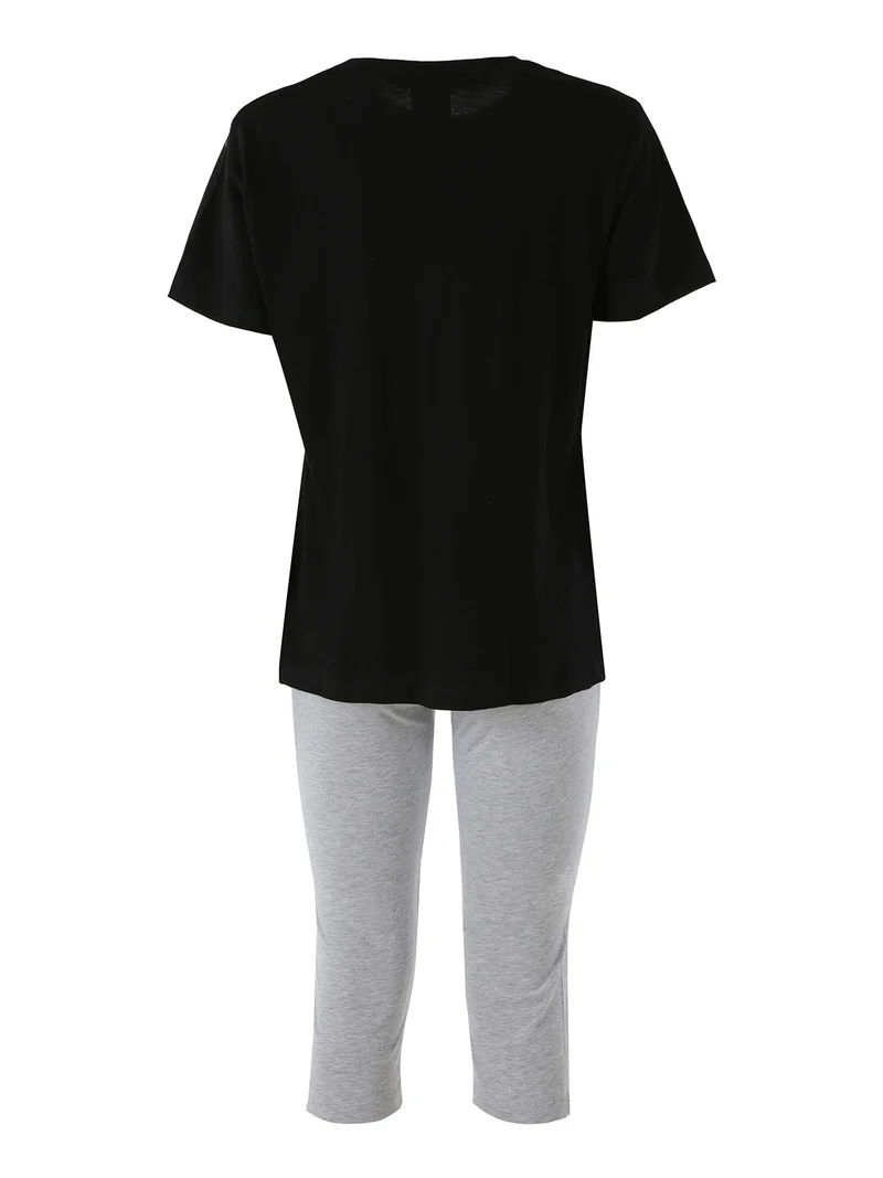 Completo sportivo da donna con t-shirt e leggings a 3/4 - nero