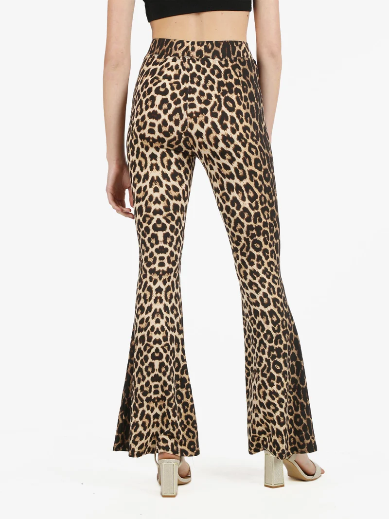Pantaloni donna a zampa maculati - cammello