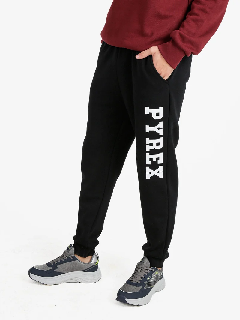 Pantaloni tuta da uomo felpati con polsini - nero