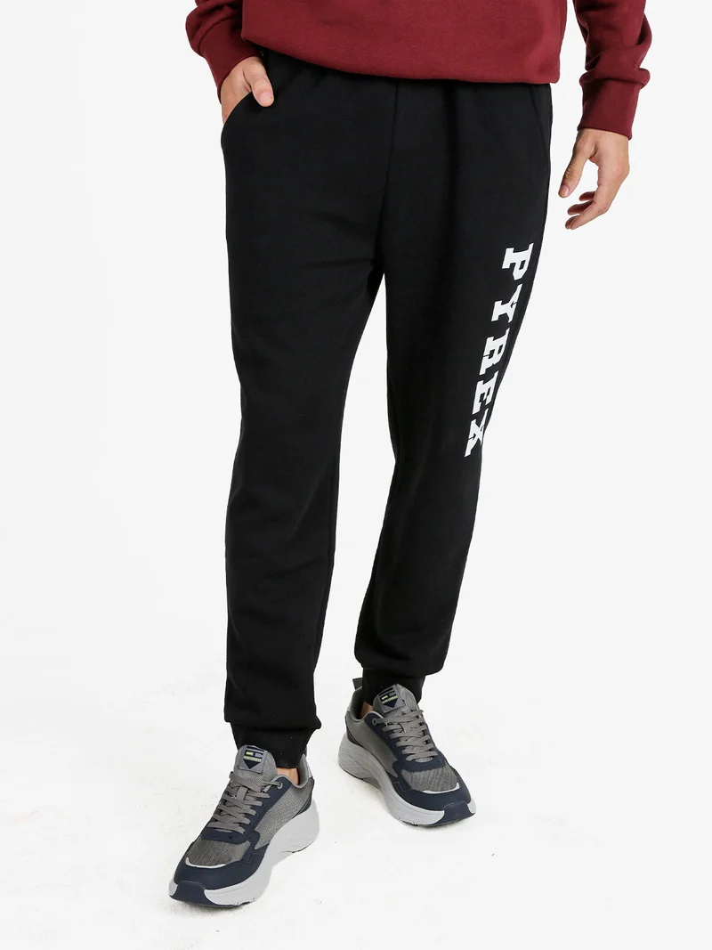 Pantaloni tuta da uomo felpati con polsini - nero