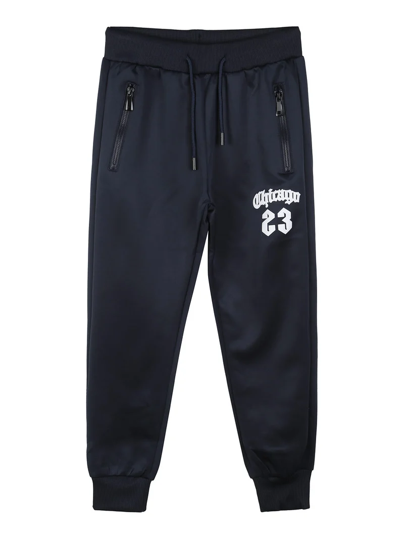 Pantaloni tuta da bambino con coulisse e polsini - nero
