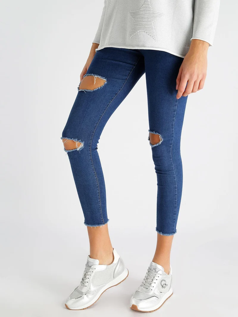 Jeggings strappati con frange - blu