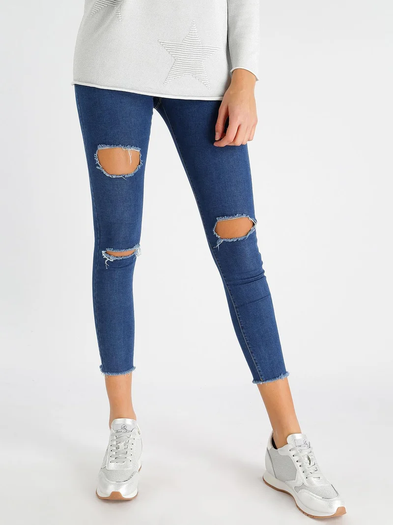 Jeggings strappati con frange - blu