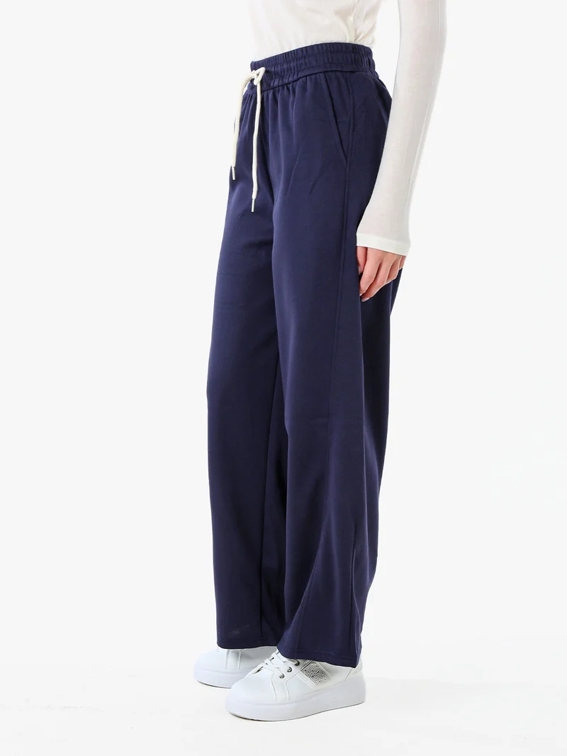Pantaloni da donna in felpa a gamba larga con coulisse - blu scuro