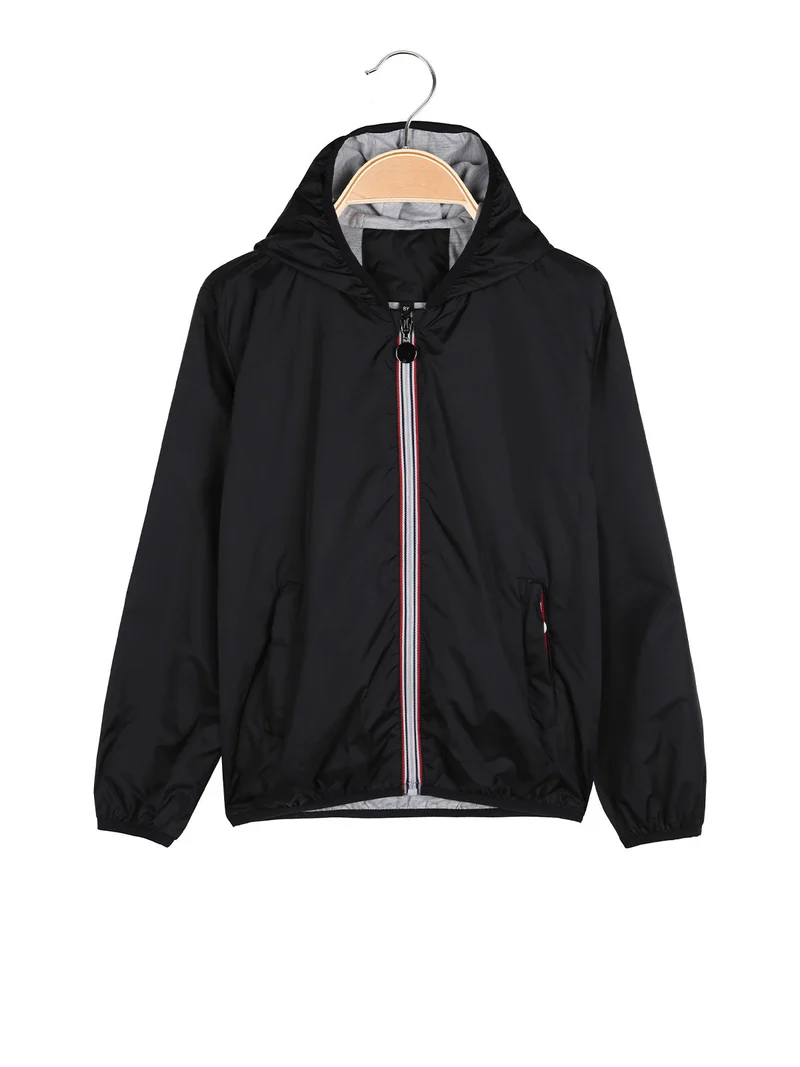 Giacca a vento da bambino con cappuccio e zip - nero