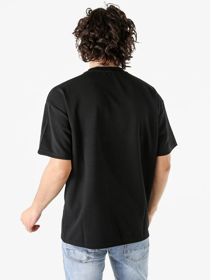 T-shirt oversize da uomo a nido d'ape - nero