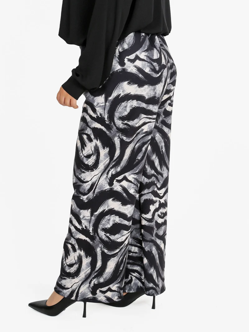 Pantaloni donna a gamba larga con stampa fantasia - grigio