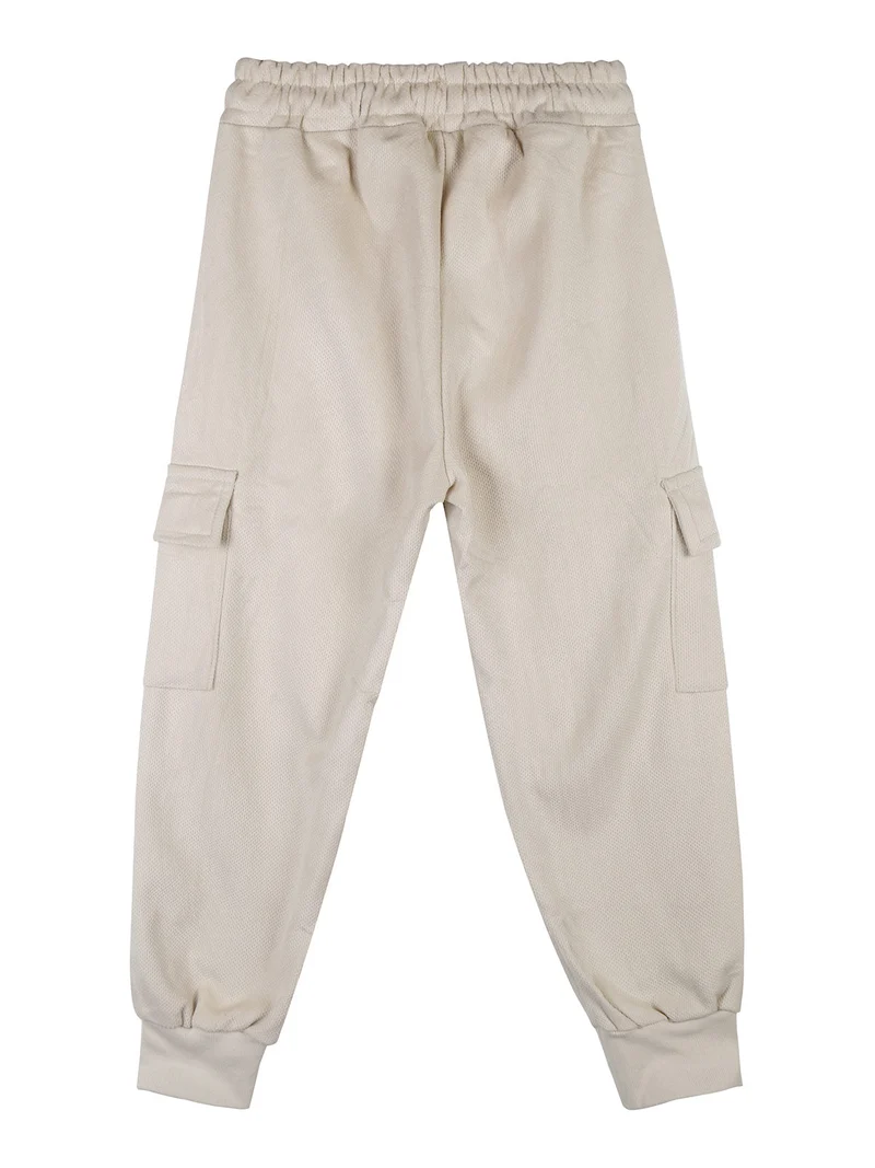 Pantaloni tuta da bambina con tasconi laterali - beige