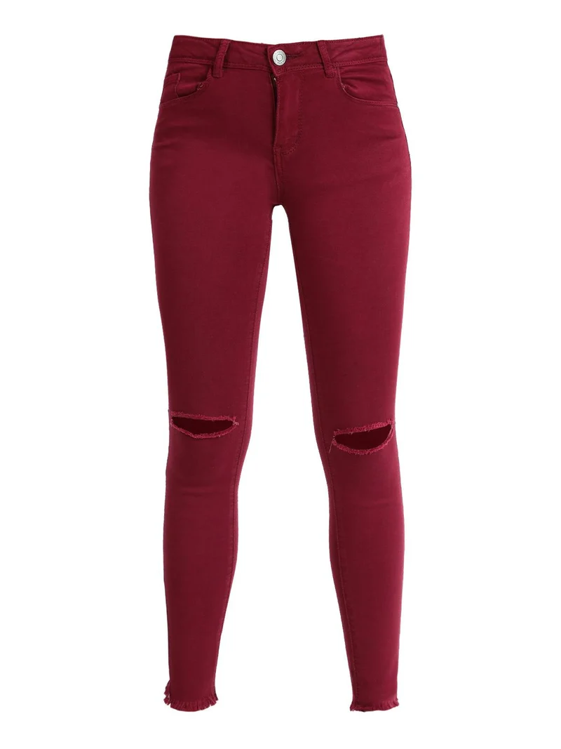 Pantaloni donna skinny con strappi - bordeaux