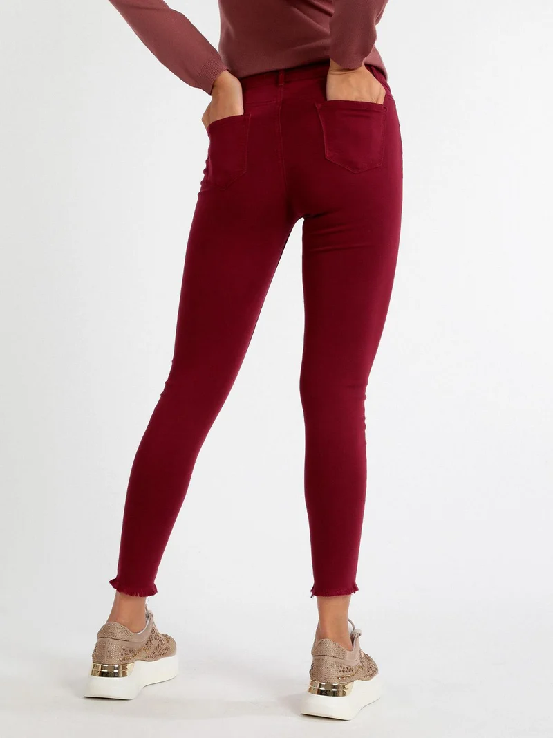 Pantaloni donna skinny con strappi - bordeaux