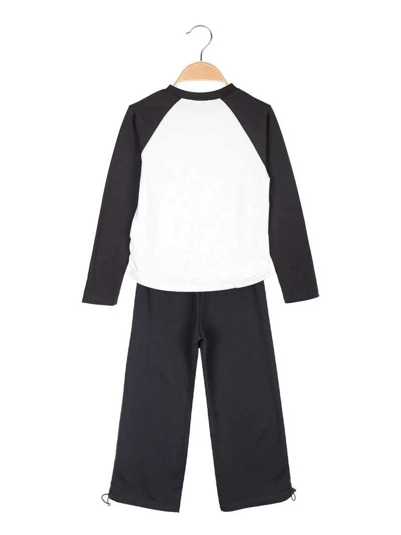 Completo 2 pezzi da bambina con maglietta stampata e pantaloni a zampa - grigio scuro