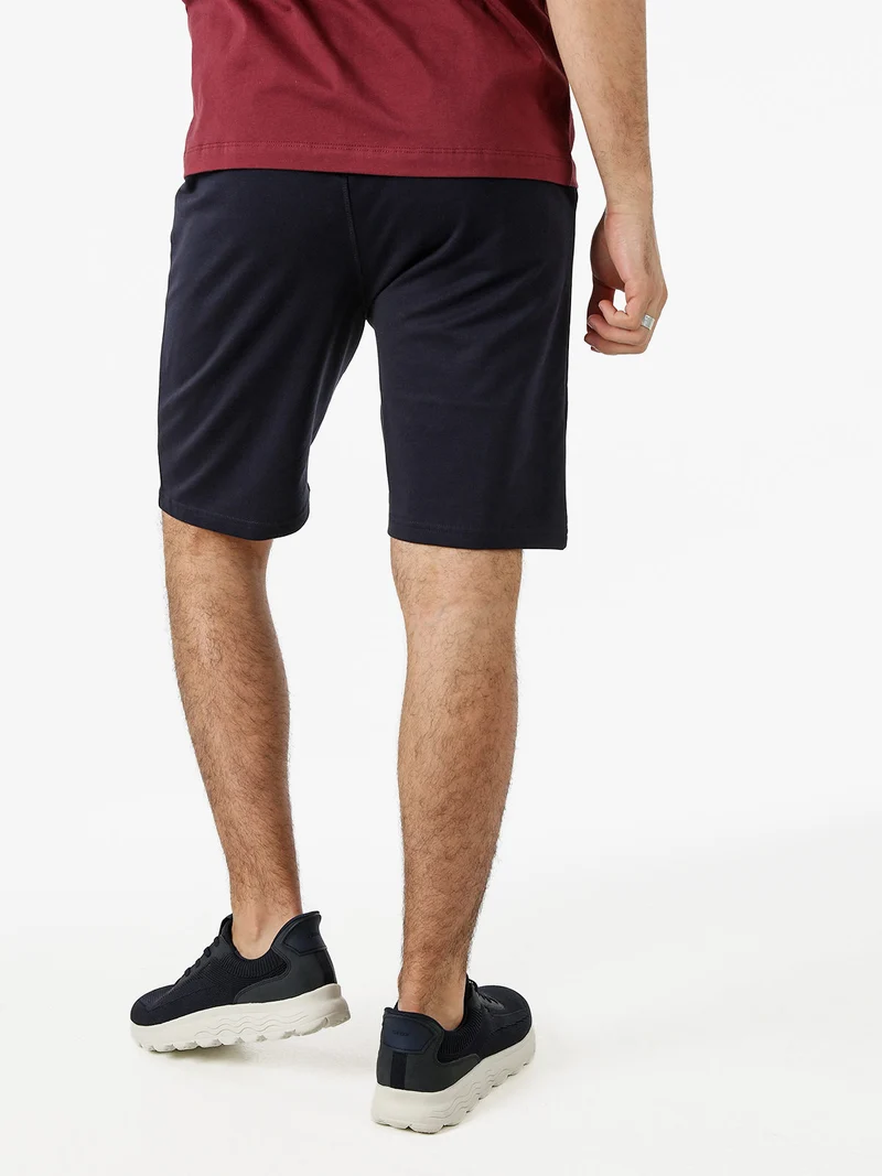 Bermuda da uomo in felpa di cotone con coulisse - blu scuro