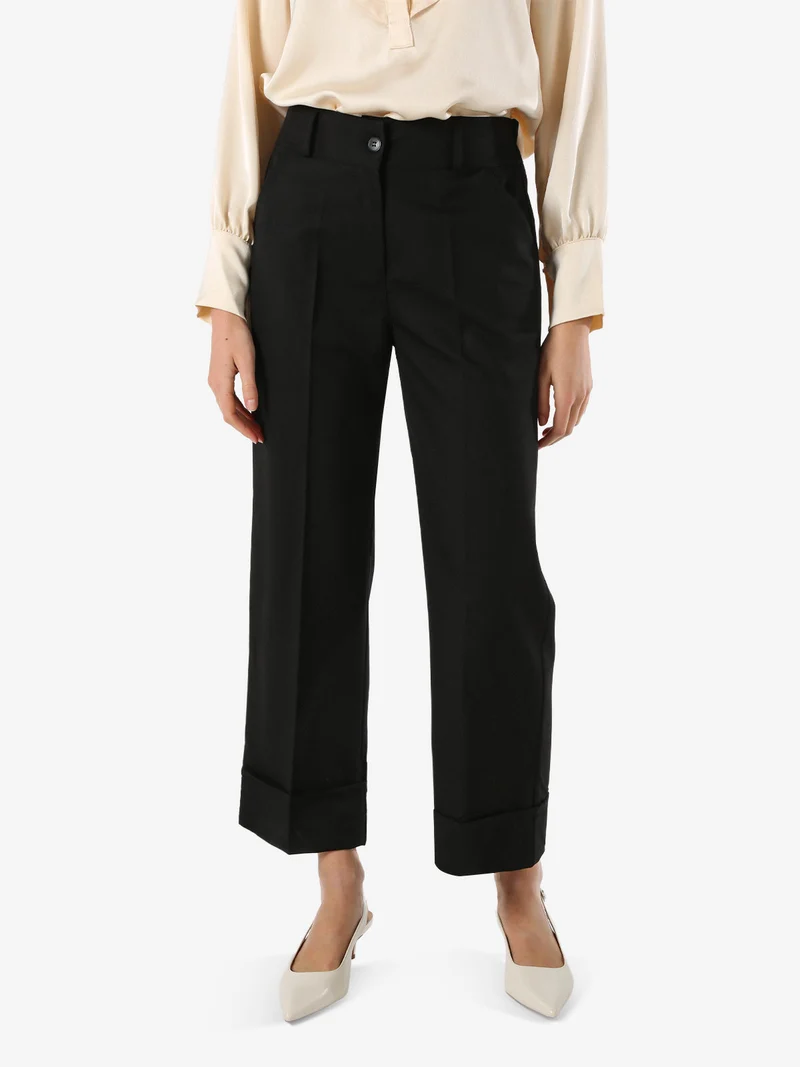 Pantaloni donna a gamba larga con ampio risvolto sul finale - nero