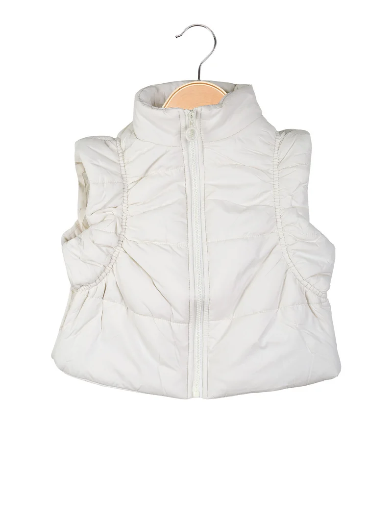 Gilet cropped da bambina imbottito - panna