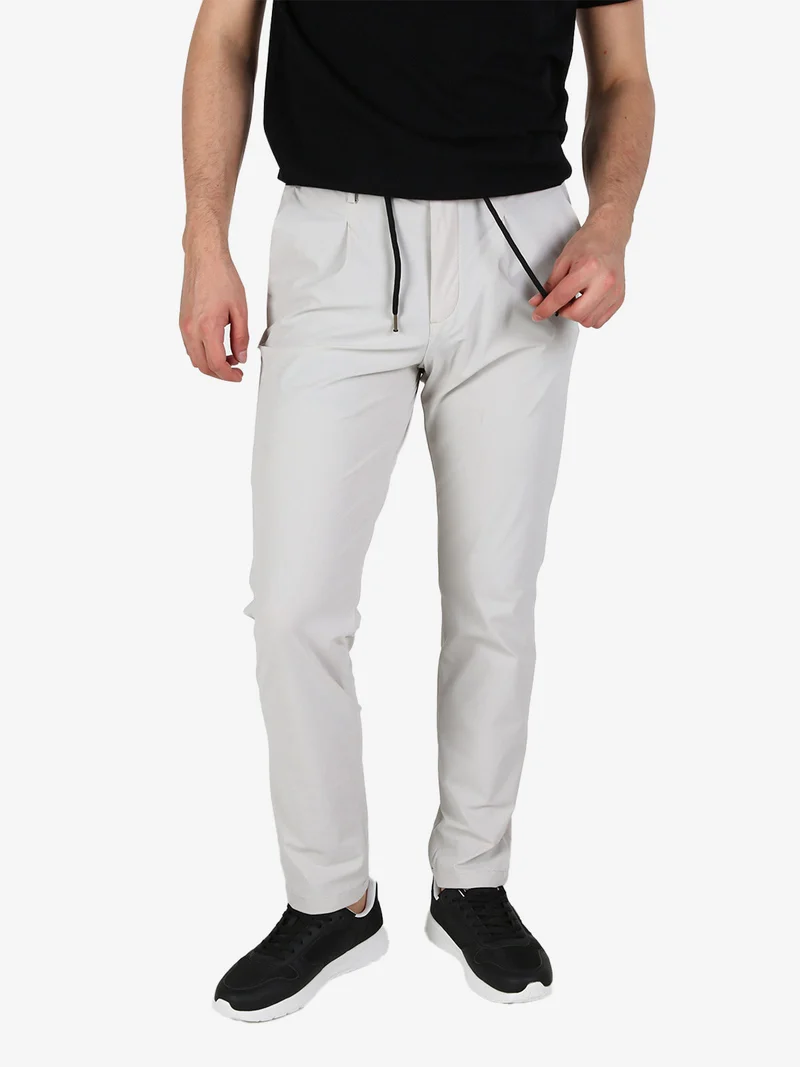 Pantaloni casual da uomo in tessuto tecnico con coulisse - perla