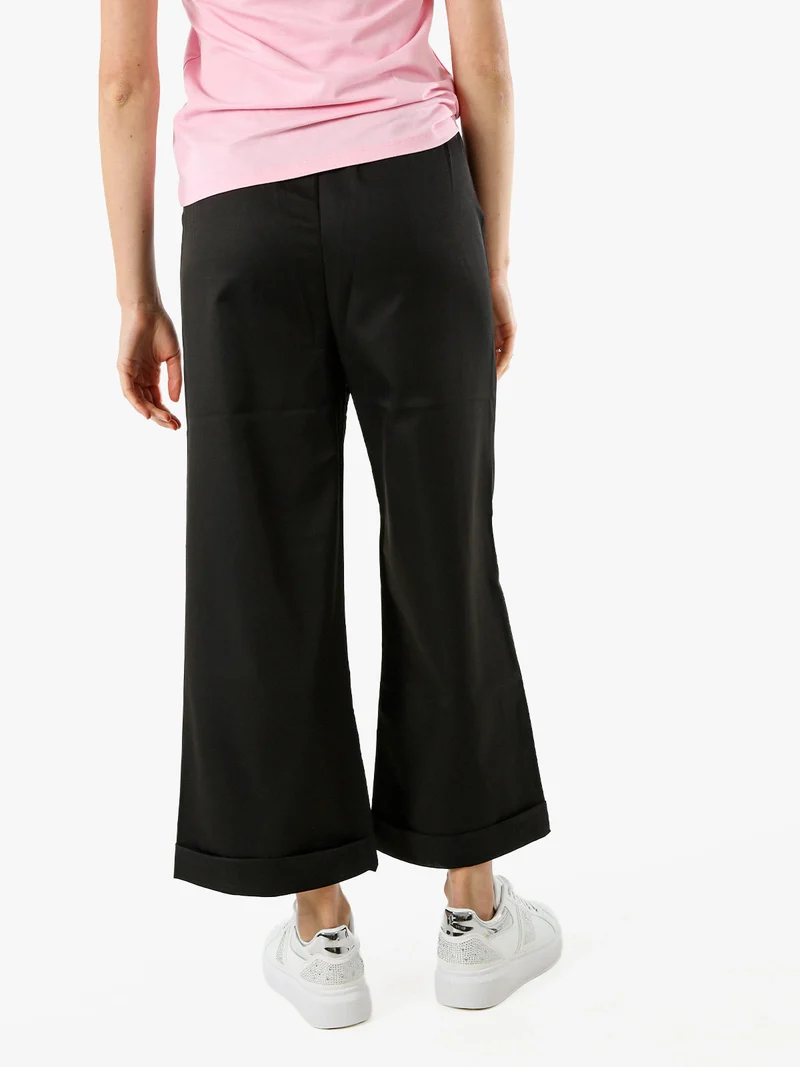 Pantaloni donna a palazzo con risvolto - nero
