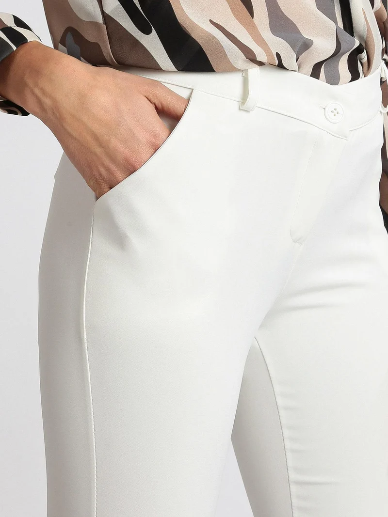 Pantaloni classici a zampa - bianco