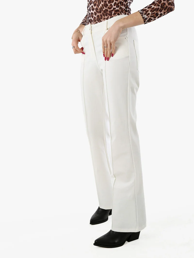 Pantaloni donna a zampa con cucitura centrale - bianco