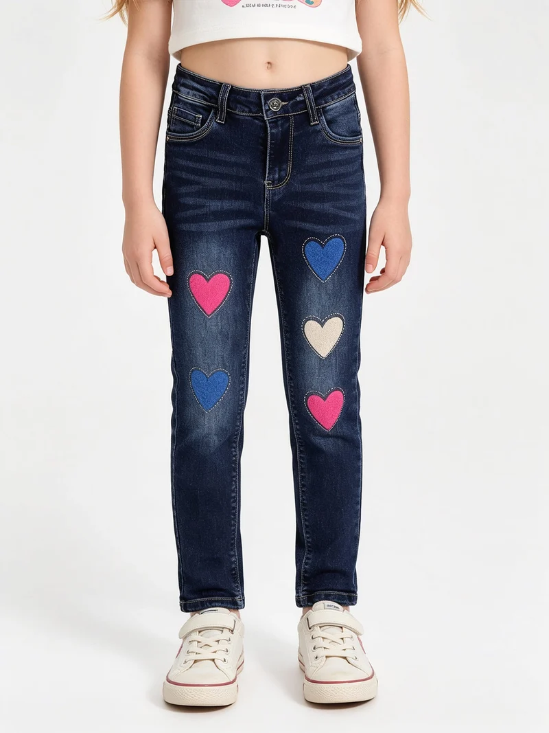 Jeans skinny da bambina con cuori di peluche e strass - jeans