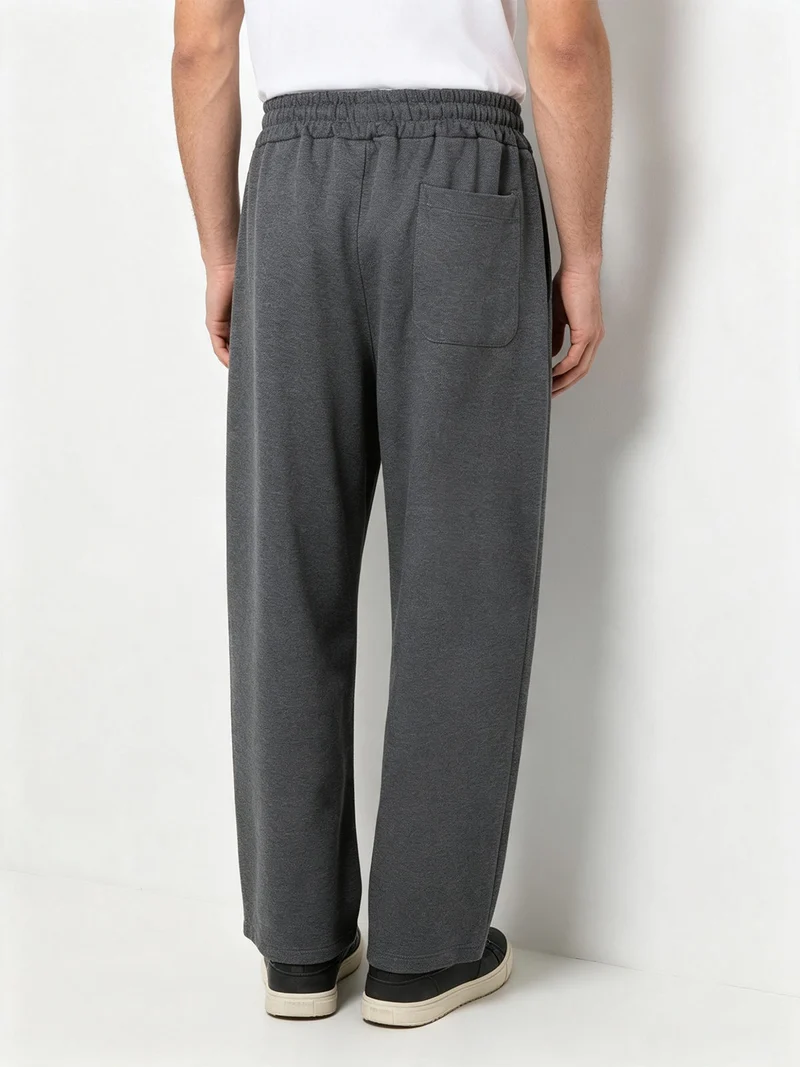 Pantaloni da uomo oversize a gamba larga con coulisse - grigio