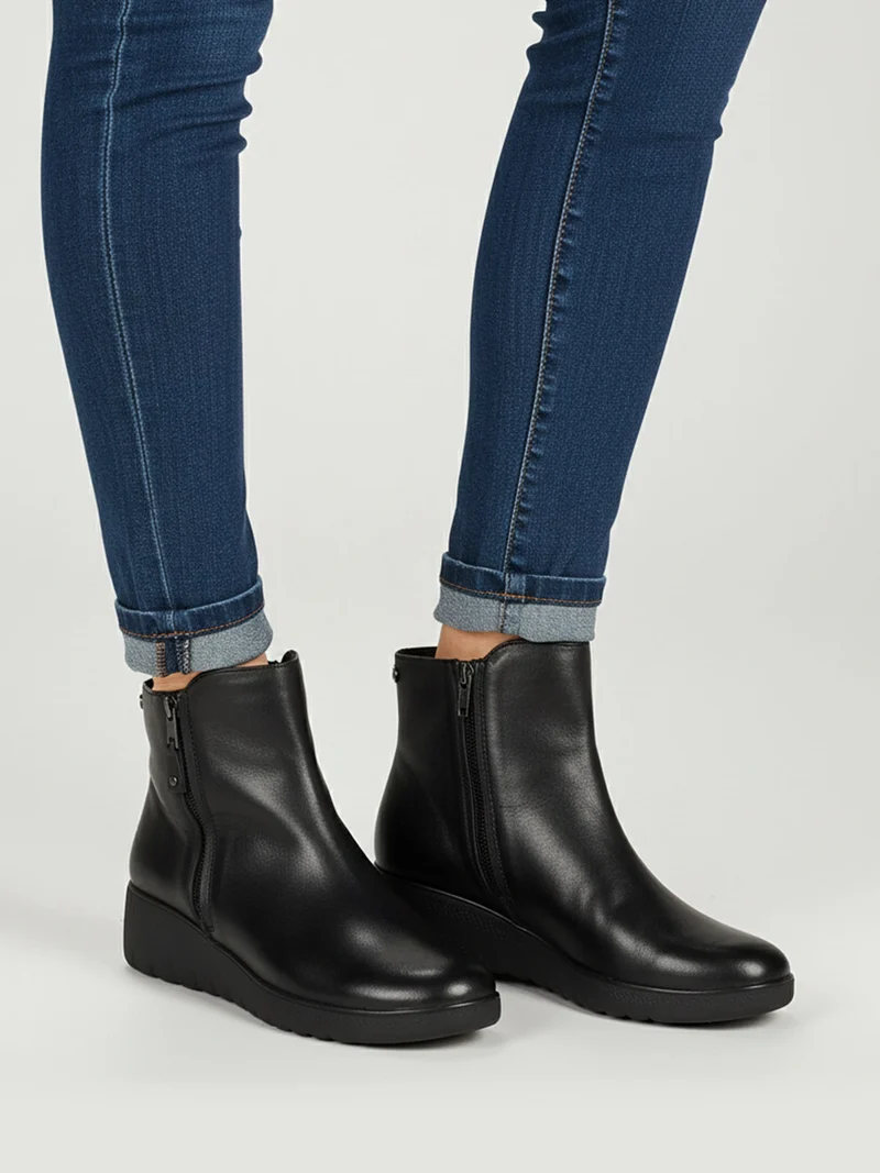 Stivaletti donna in pelle con zeppa e doppia zip - nero