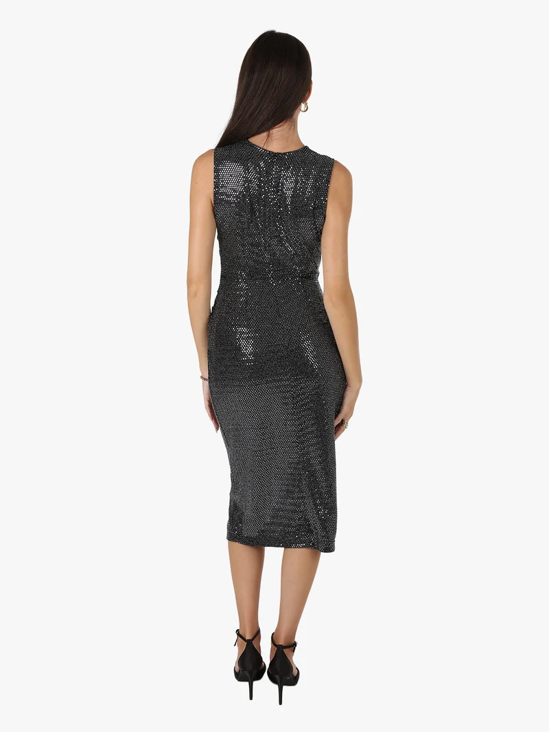 Abito smanicato da donna in lamè metallico - nero