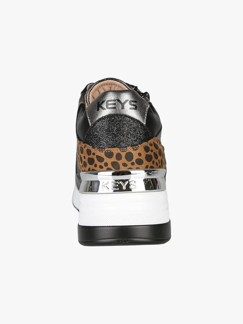 Sneakers donna in pelle con zeppa - nero