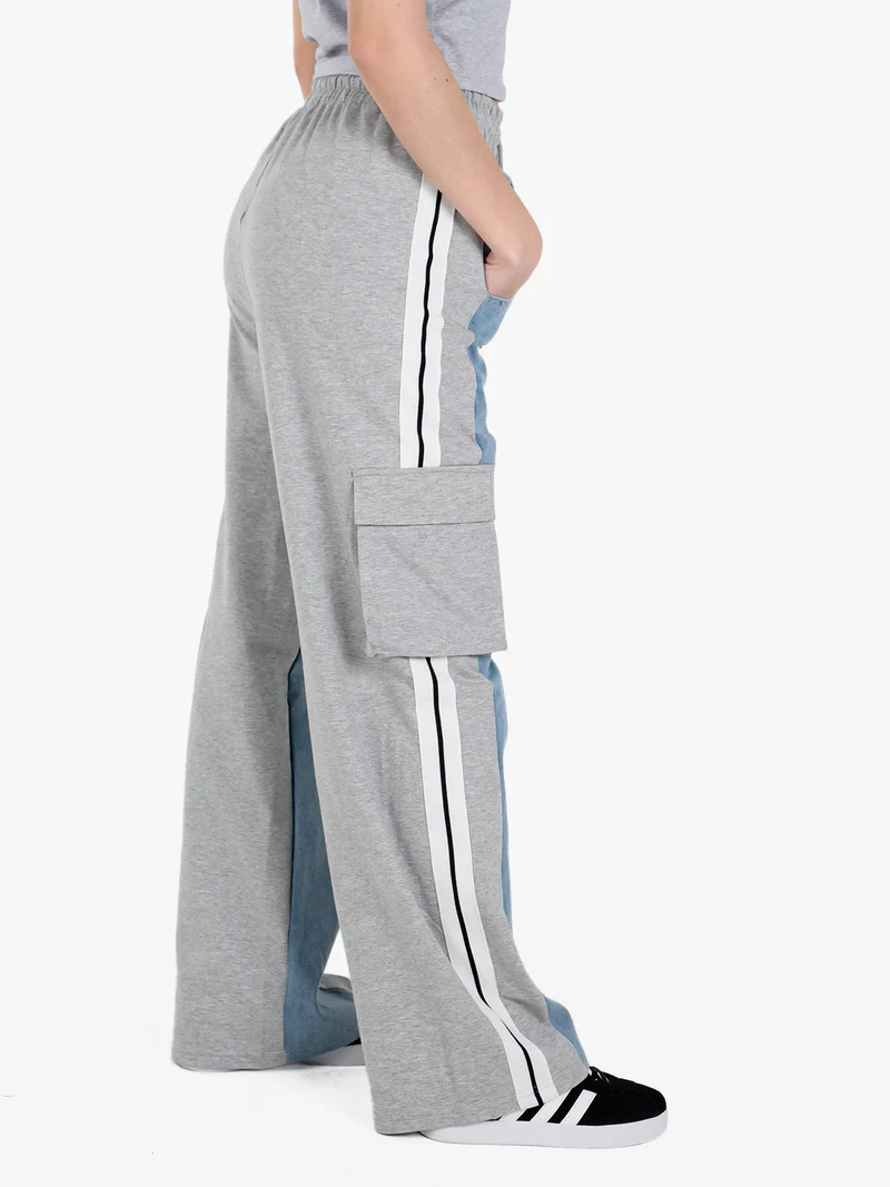 Pantaloni donna a gamba larga con tasconi e coulisse - grigio