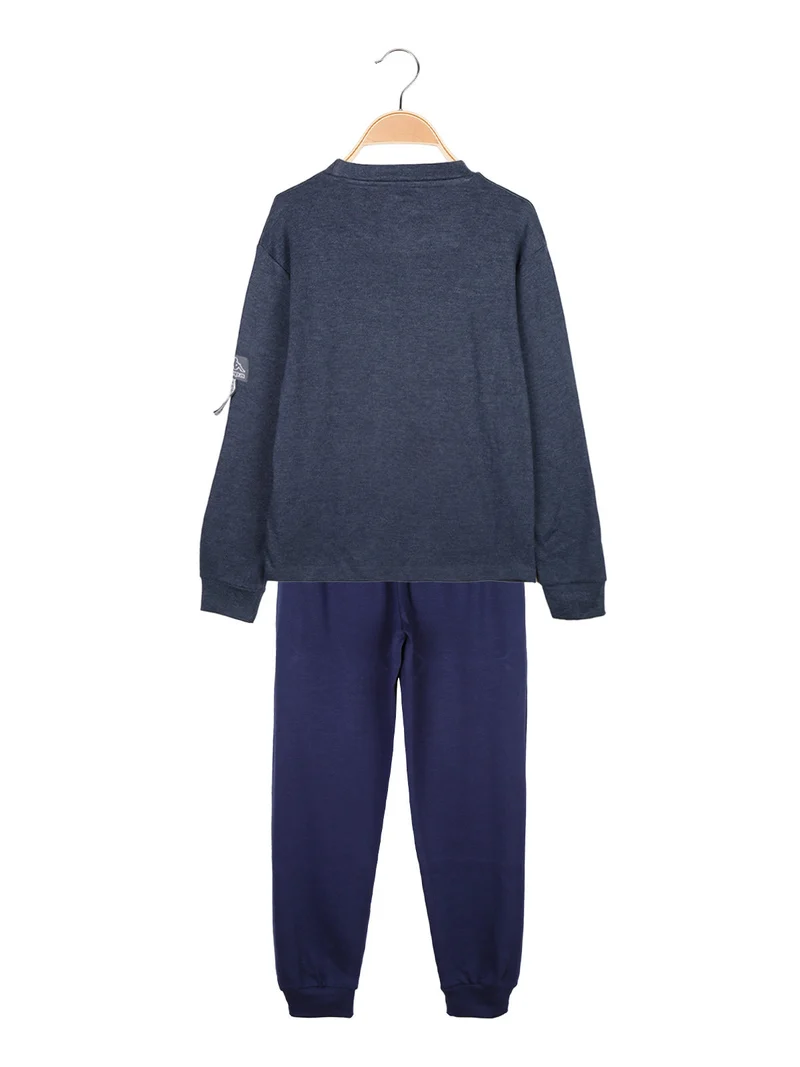 Pigiama lungo da ragazzo in cotone interlock - blu
